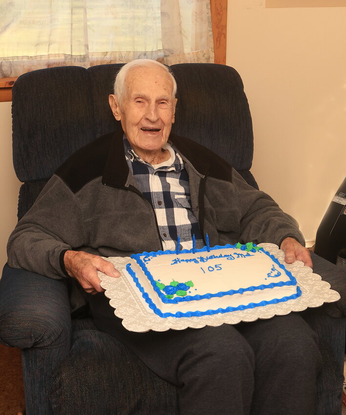 Mel Baker celebrates turning 105 with cake at Smith Hill Methodist Church in Honesdale, PA.