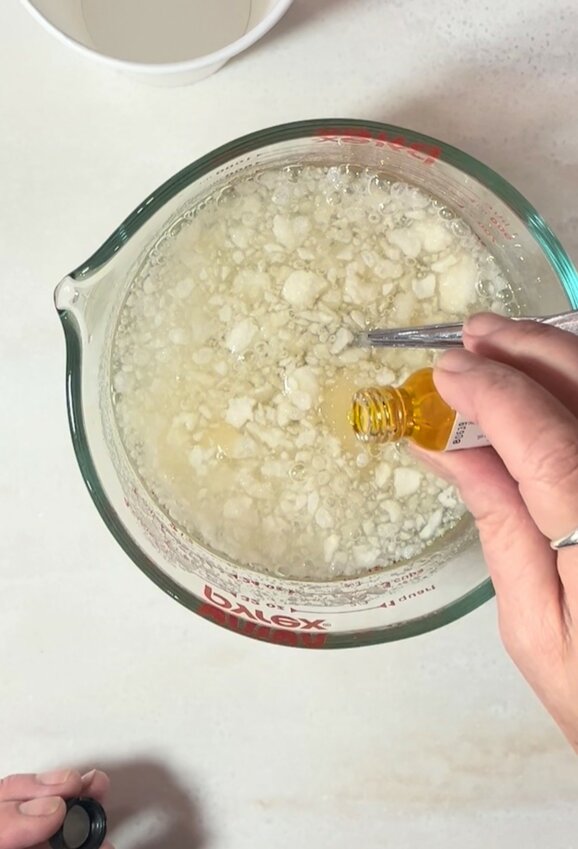 Add 6 drops of flavoring into the gelatin mixture and stir.