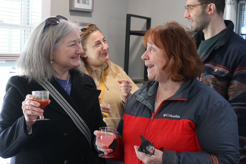 Members of the community celebrate the opening of Nikki C's Seafood and Catering grand opening.