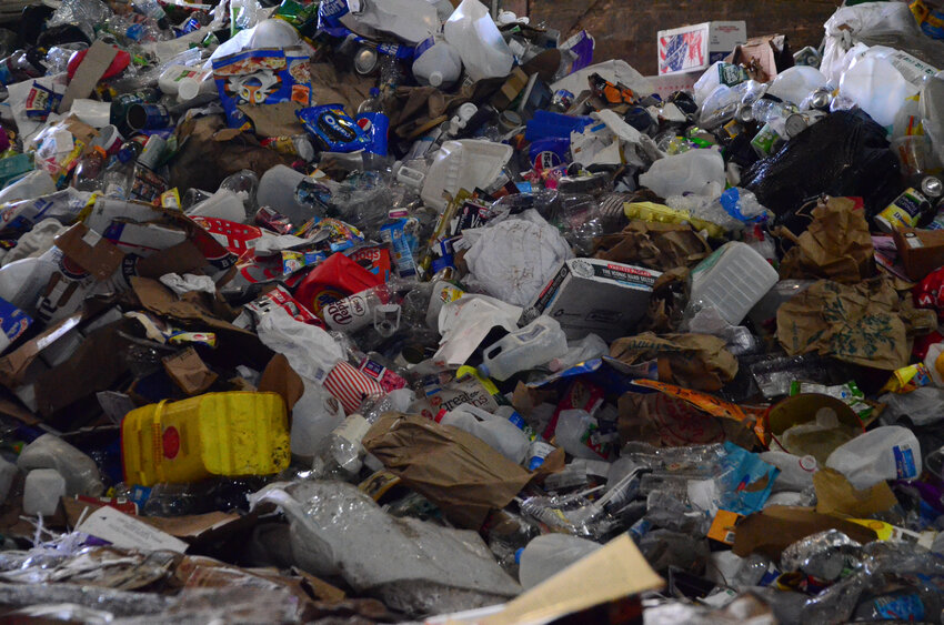 Piles of single stream recycling at the Monticello transfer station.