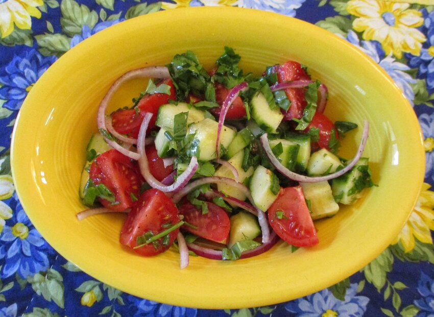Tomato and cucumber salad with herbs