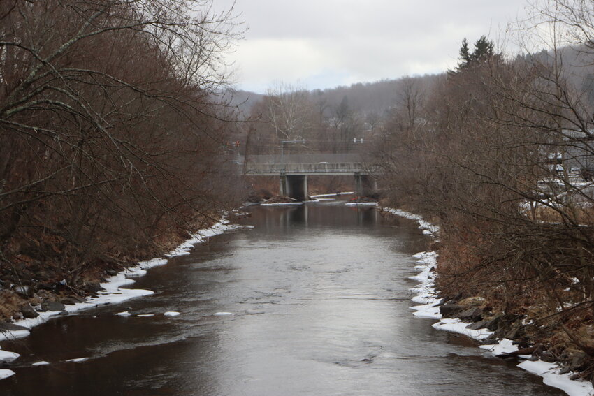 The Lackawaxen River is pictured here as seen from a pedestrian bridge off Court Street as it flows through Honesdale.