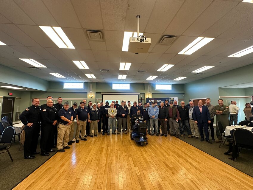 A group photo of the local Veterans, along with the three guest speakers. Their service was honored at the Veterans luncheon hosted by East Coast Industrial Services, Inc. and the Presutti family.