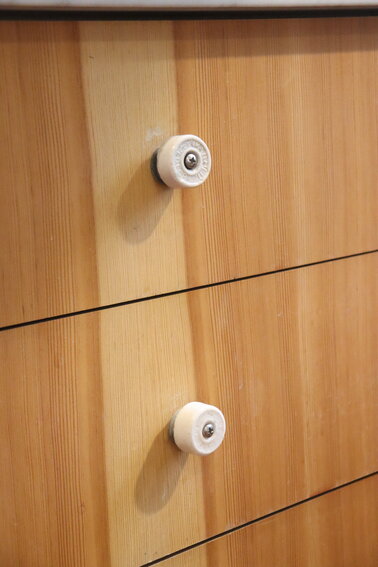 …and like these kitchen drawer pulls, made from implements that used to hold electrical wires.