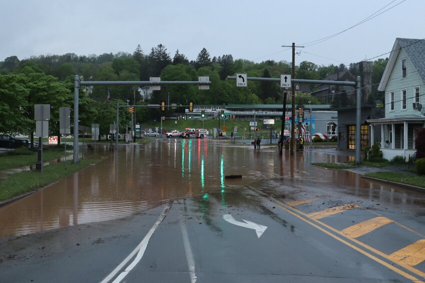 Emergency services closed off the flooded intersection between 4th Street and Main Street on Tuesday, May 6.