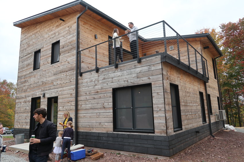 This Catskill Project model home was open to inspection on October 8, 2021. The 2283 square foot house is built to Passive House standards that includes a continuous building envelope, superinsultation, a robust ventilation system, and high-tech windows. It is part of a 90-acre subdivion that will preserve 40 acres as a nature preserve.