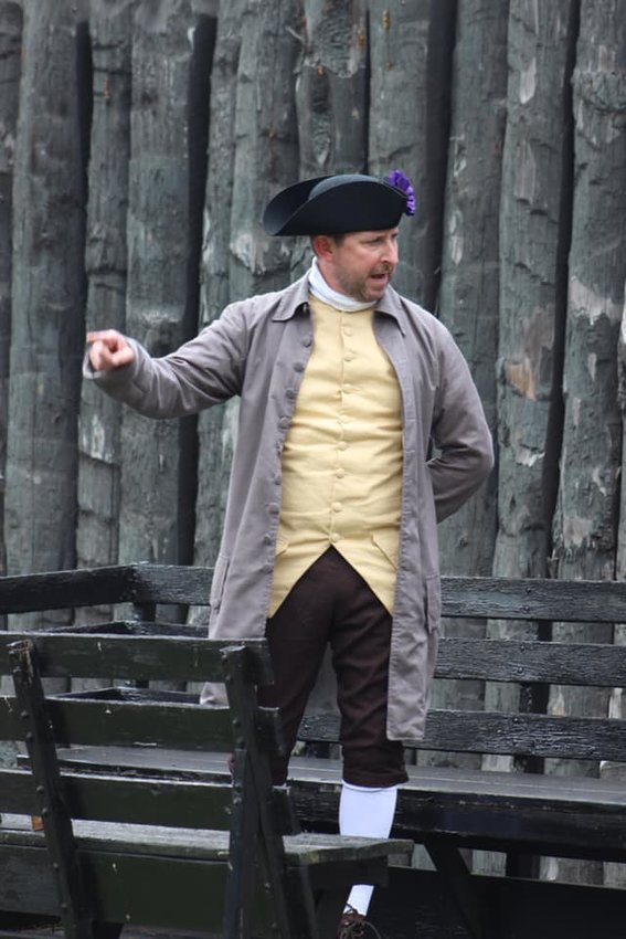 Bill Chellis, as magistrate Robert Land, delivers the Loyalist response to the reading of the Declaration of Independence at last year&rsquo;s Patriots and Loyalists event...