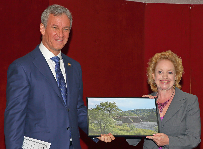 KEYNOTE SPEAKER: U.S. Representative Matt Cartwright previously joined the Upper Delaware Council at its April 28, 2019 River Valley Awards banquet, shortly after winning election to serve the constituents of the redistricted PA 8th Congressional District. UDC Executive Director Laurie Ramie, right, presented him with a framed photo of the National Park Service&rsquo;s Roebling&rsquo;s Delaware Aqueduct for his new district office in the Hawley Silk Mill building.