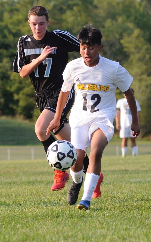 Hot-footin&rsquo; it. Sullivan West&rsquo;s Ethan Hoch is in pursuit of Fallsburg&rsquo;s Christian Garcia. Earlier in the match, Garcia scored the Comets&rsquo; first goal at the 23:00 minute mark in the opening frame.