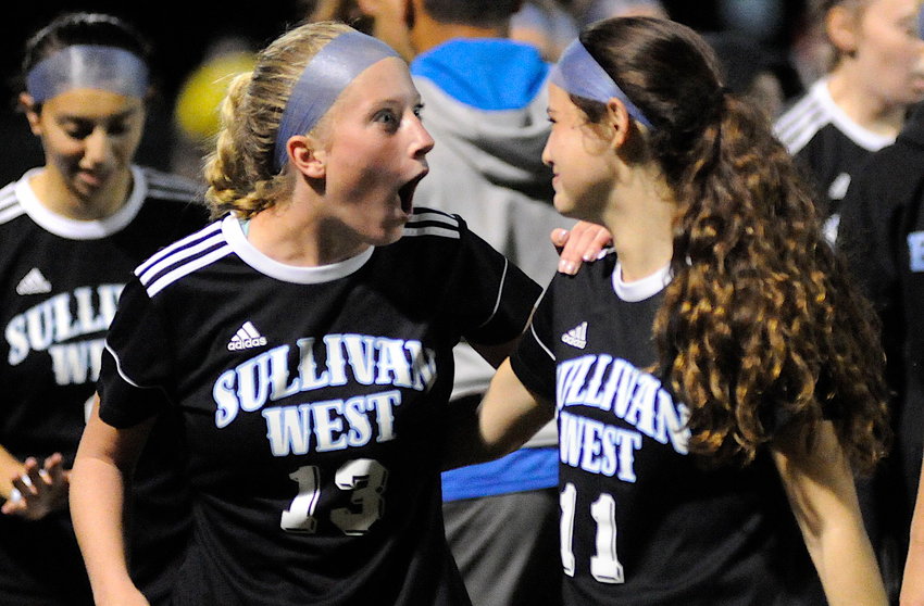 Jubilation. Sophie Flynn and Brooke Nunnari, a sophomore, played in five games and posted two assists. They are pictured with their teammates, celebrating Sullivan West&rsquo;s 3-1 win over the Lady Spartans of S.S. Seward. &ldquo;Brooke joined us halfway through the season and was a huge help.&rdquo;