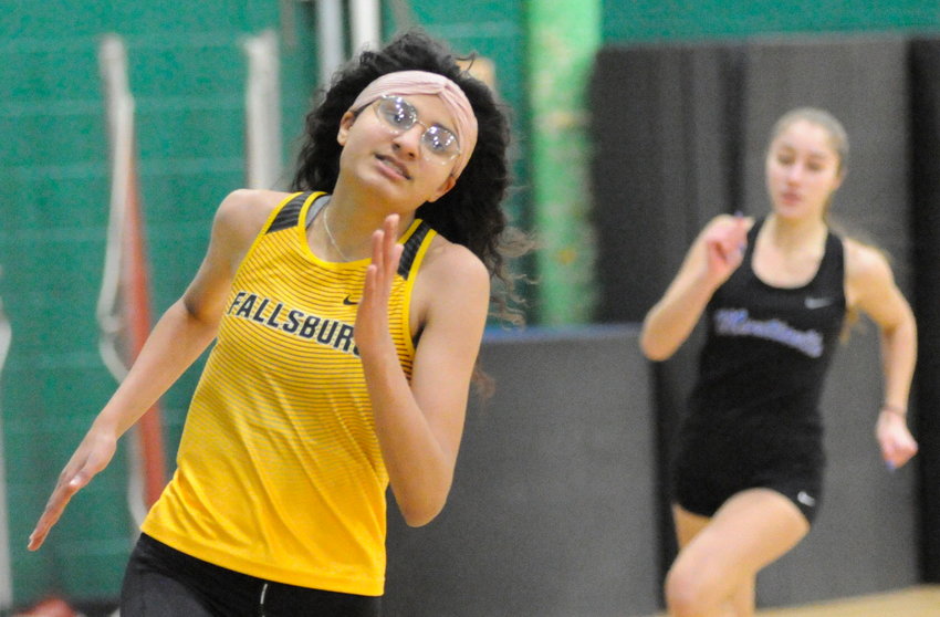 Fallsburg&rsquo;s Gisella King, a senior, is pictured with a Monticello runner in close pursuit.