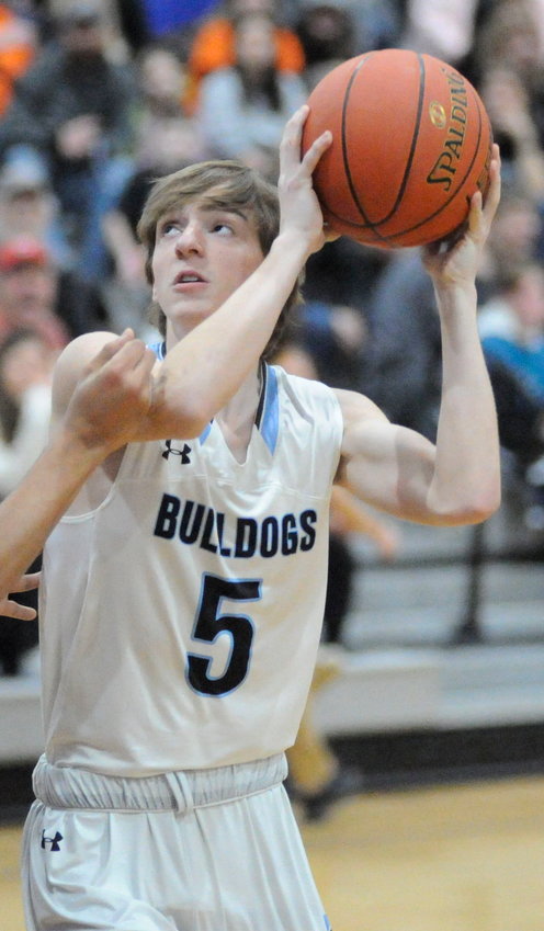 Rising to the occasion. Sullivan West&rsquo;s Allyn Walter eyes the rim.