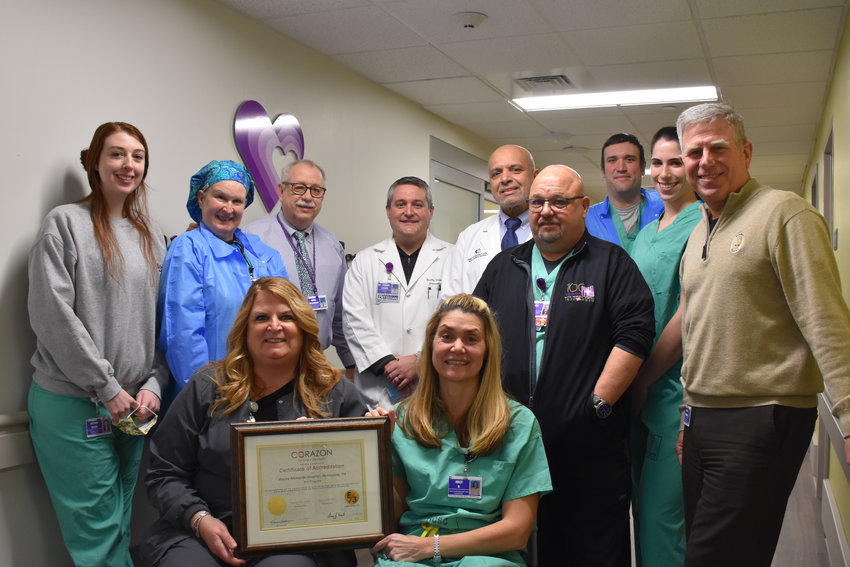 Wayne Memorial Hospital&rsquo;s cardiac catheterization lab, the Heart and Vascular Center, has been re-accredited. Pictured are, standing: Cassidy Cohen, left; Colleen Shaffer; James Hockenbury; Dr. Bradley Serwer; Dr. Walid Hassan; Frank Reid; Chris Fehnel; Kristen Schmale; and Rob Brzuchalski. Seated are Sandra Skrobiszewski, left, and Holly Reddock.