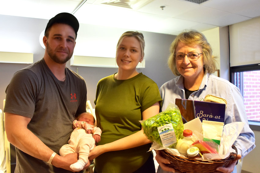 Annabelle Thumann was born at Wayne Memorial Hospital on National Agriculture Day, March 21. Pictured are Ryan Thumann, left; Annabelle; Natalie Gawron; and Bonnie Latourette...