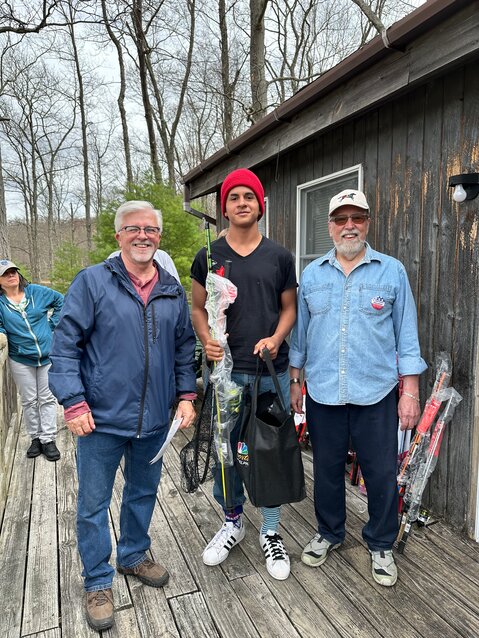 Commissioner Matthew Osterberg, Gage Salazar, and Commissioner Tony Waldron at the Pike County Commissioner&rsquo;s annual fishing derby.