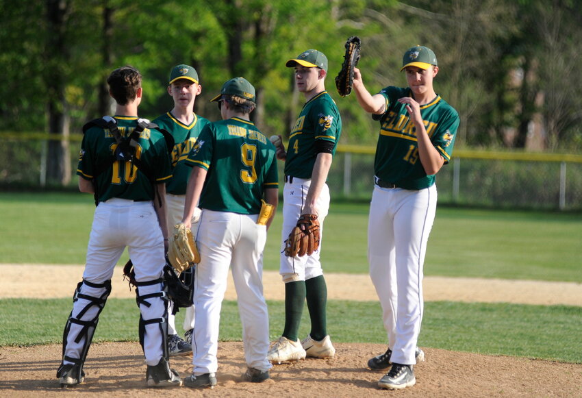 Conference call. Josh Warming, second from right, earned Eldred&rsquo;s Most Valuable Player Award in varsity baseball. He is pictured on the mound, talking the game of swats with his infield during a game against the Wildcats of Livingston Manor and Roscoe on May 15.