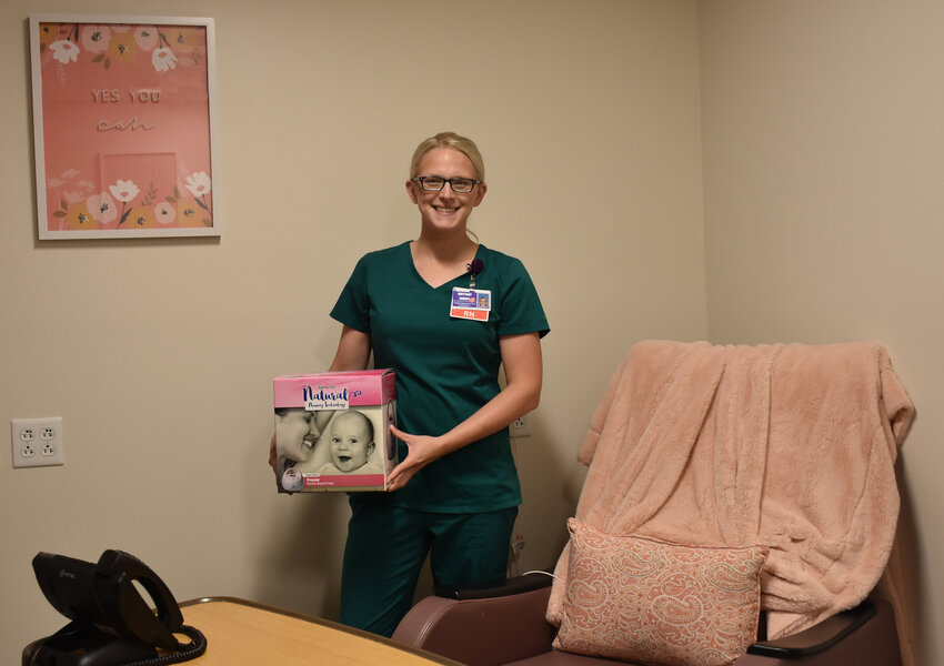 Brittany Kimble, RN, who provides lactation consultations for patients at Wayne Memorial Hospital and Wayne Memorial Community Health Centers, is shown standing in the hospital&rsquo;s Lactation Room. The room is a special accommodation for employees who are lactating mothers and may be utilized for up to one year following the birth of their child.