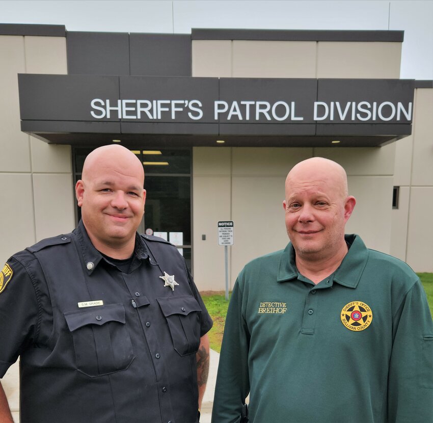 Deputy Sean Grady, left and Detective Eric Breihof assisted a swimmer in distress on July 20.