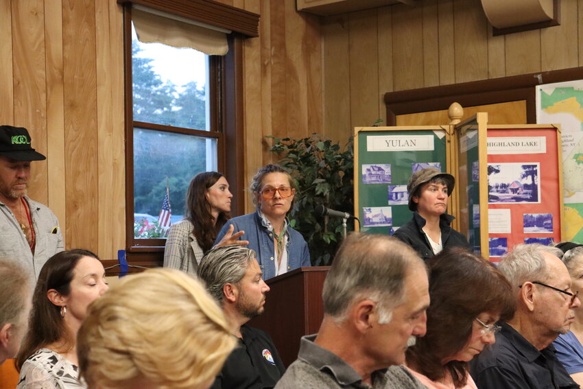 Courtney Crangi, at podium, discussing her proposal for a cannabis agricultural project at the Town of Highland planning board meeting of Wednesday, August 23; co-applicant  Shane Pearson is pictured standing to her left.