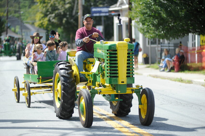 George Varsam and his 1948 John Deere Model M was one of many restored farm tractors...