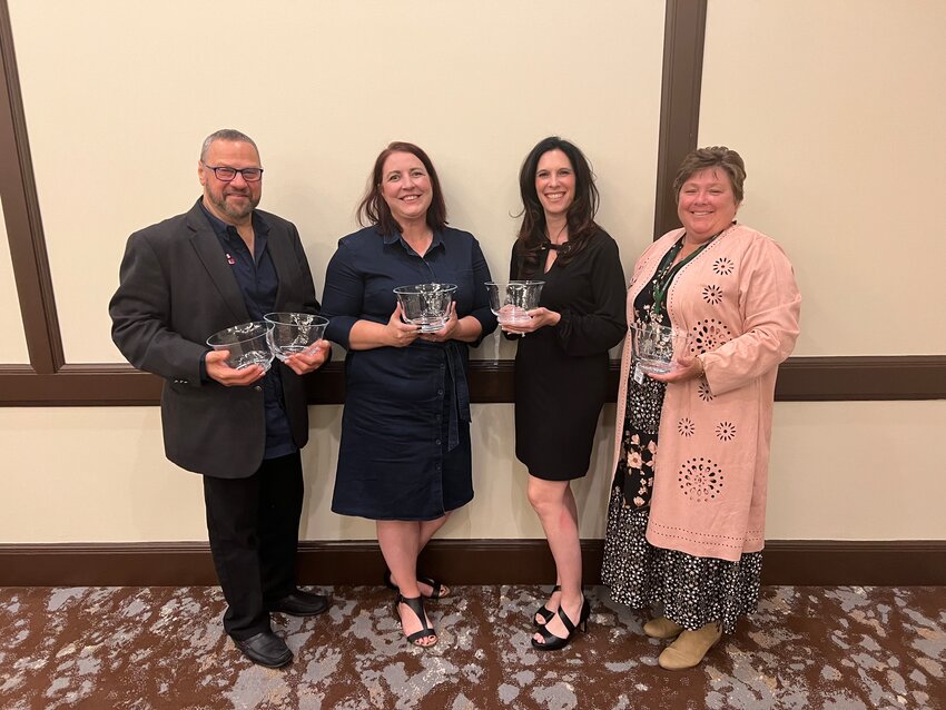 Radio hosts Paul Ciliberto, left, and Jenn Clarke pose with Bold Gold Media General Manager Dawn Ciorciari, and Sullivan County Public Health Deputy Director Jill Hubert-Simon at the New York State Broadcaster's Association awards ceremony.