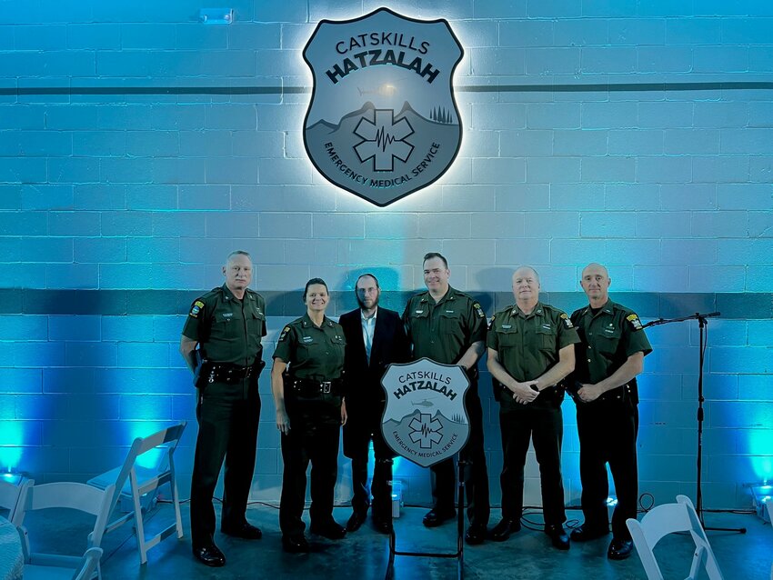 Colonel James Boylan, left, DEC Law Enforcement Director Karen Przyklek, Rabbi Joel Gold, major Brian Gillis, captain Martin Townley and lieutenant Michael Bello attend a networking event in Sullivan County, hosted by Catskills Hatzalah.