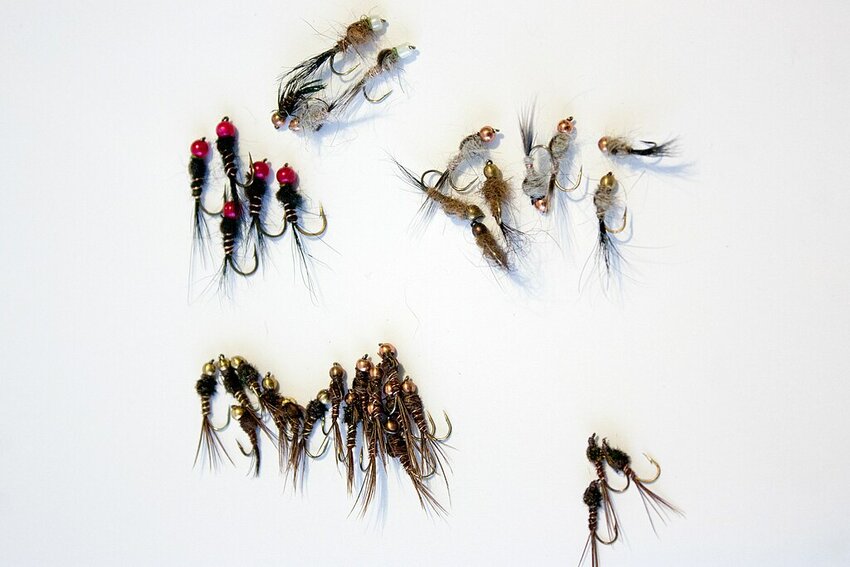 More than 100 fly tiers, demonstrators, instructors and celebrities will show their best fish-catching creations at the 32nd annual..International Fly Tying Symposium on November 11 and 12. The pictured flies might not be tied there, but you'll see plenty more. Link to file: creativecommons.org/licenses/by-sa/2.0.