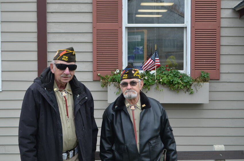 Veterans pose outside of Highland Town Hall after Veterans Day ceremony.