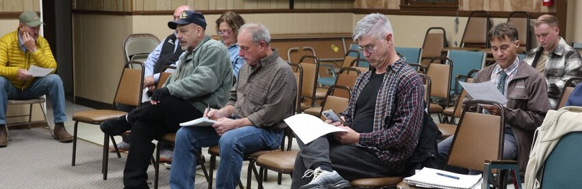 Jim Akt, far left, regularly attends Highland town board meetings, and is pictured here on October 10 in his usual spot at town hall. Others pictured are, from left: James Sallusto (partially hidden), Peter Carmeci, board member-elect Thomas Migliorino, supervisor-elect John Pizzolato, unknown person, and Matt McPhillips, county legislator-elect for District 1.
