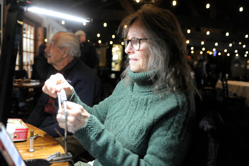 Judy Van Put puts the finishing touches on a Elk Hair Caddis dry fly during Fly Fest &rsquo;24. She is a long-time member of the NYS Outdoor Writers Association and a recipient of the NYS Council of Trout Unlimited Professional Communications Award...