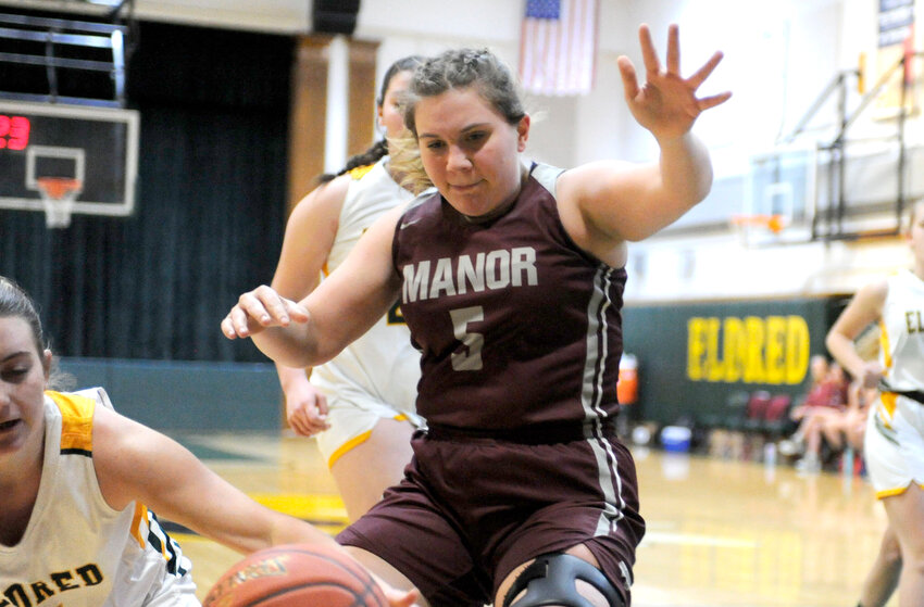 A moment frozen in time. Manor&rsquo;s Sarah Evans is pictured in a game against the Lady Yellowjackets of Eldred. She received the Coaches Award in varsity girls&rsquo; basketball for 2023-2024..