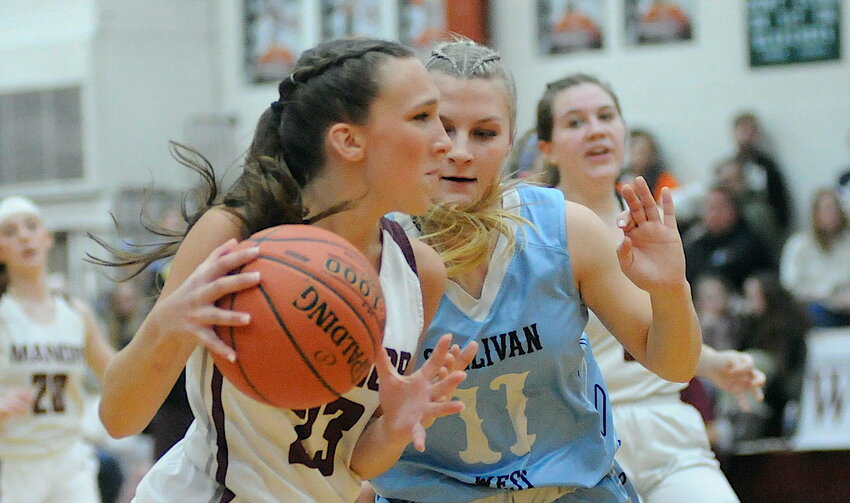 Abby Parucki on defense in January against Anastasia Niforantos of Livingston Manor&rsquo;s Lady Wildcats...