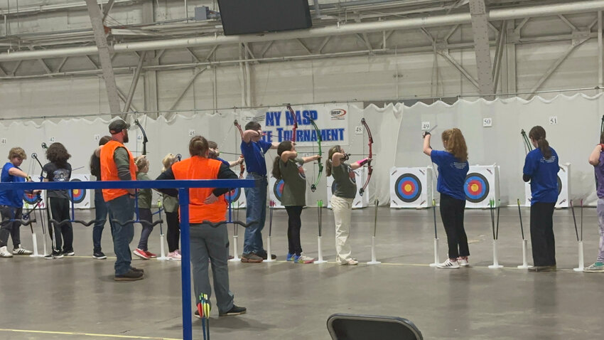 Students take aim during the New York State National Archery in Schools tournament.