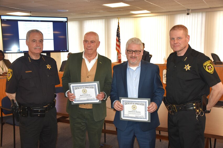 From left: Sheriff Mike Schiff, Martin Rutberg, Lawrence Breslow, and Undersheriff Eric Chaboty.