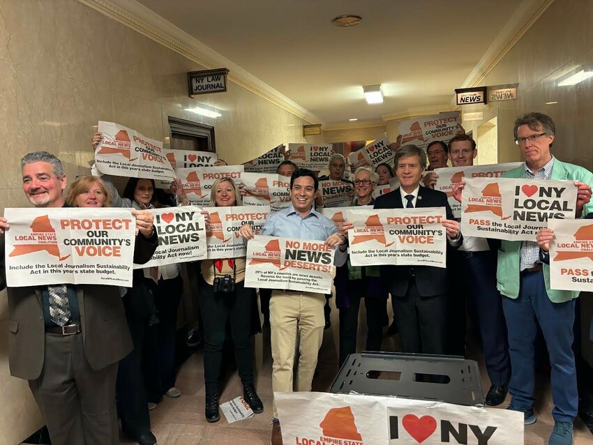 Publishers from across the state, including River Reporter publisher Laurie Stuart, stand with NYS Senator Brad Hoylman-Sigal, center in suit, who sponsored the Local Journalism Sustainability Act, on March 20. The $30 million annual tax credit refund for the hiring of journalists is now part of the state's FY2025 budget.