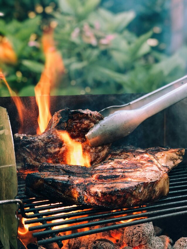 Is this person grilling safely? We have no idea! Maybe! But grill owners can benefit from the grilling tips here.