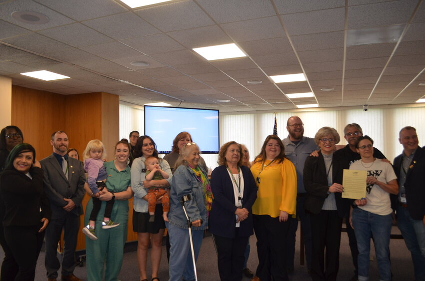 The LGBTQA+ community and allies celebrate Sullivan County's Pride Month declaration with legislators.
