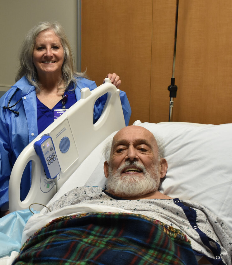 Wayne Memorial Hospital now offers dialysis. Pictured are Cindy Houser, R.N., and Charles Detore, dialysis patient...