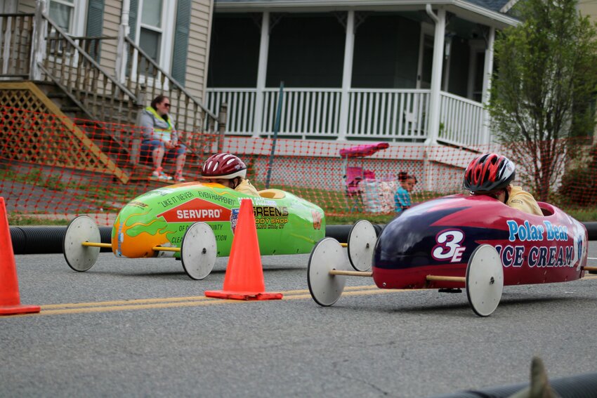 Adalena Volpe races Elena Heater in the Super Stock Division of the 2024 Soap Box Derby in Port Jervis, NY.