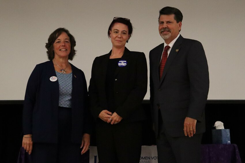 Robin Schooley Skibber, left, the Democratic candidate for the 139th District seat in the Pennsylvania House of Representatives, stands with Amy Widestrom, the executive director of the League of Women Voters Pennsylvania, and Representative Jess Olsommer, the Republican and Independent candidate for the seat.