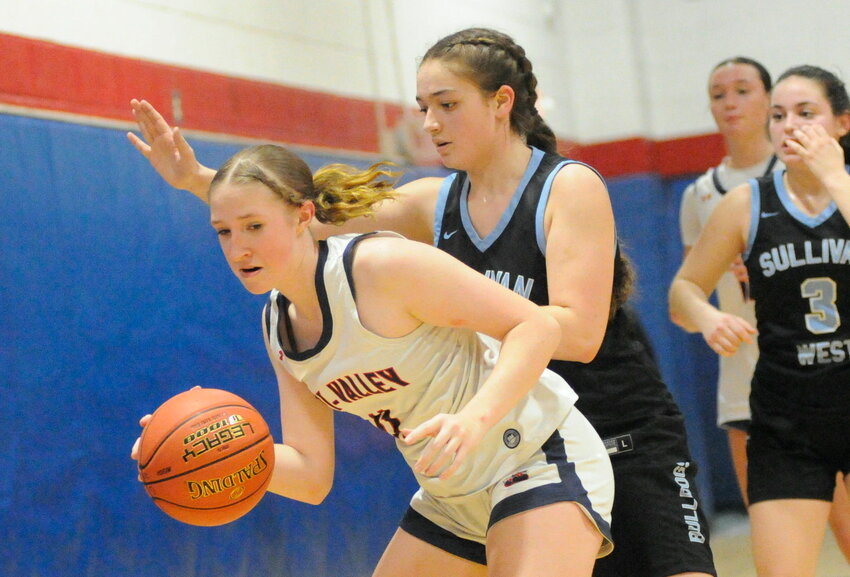 Possession under pressure. Kaitlyn Stungis of the Lady Bears is challenged by Sullivan West&rsquo;s Roz Passante.