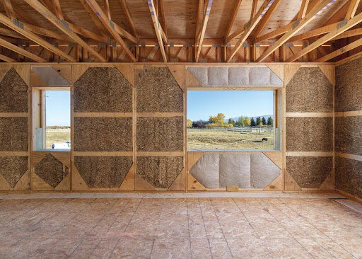 New Frameworks' straw structural insulated panels (S-SIPs); the architecture firm is Love|Schack Architects.