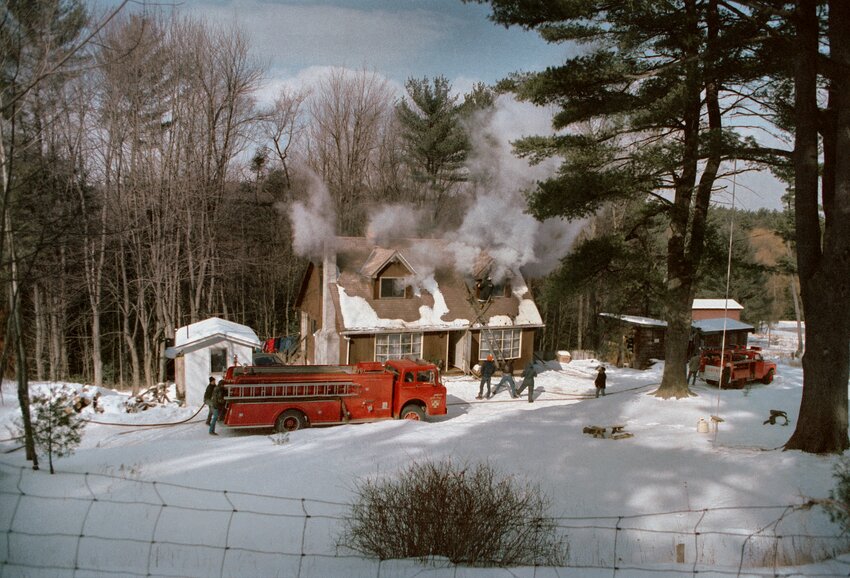 Photographer George Haas captures a house fire as part of &quot;Greetings from Here,&quot; on exhibit in Sullivan Public through the month of April.