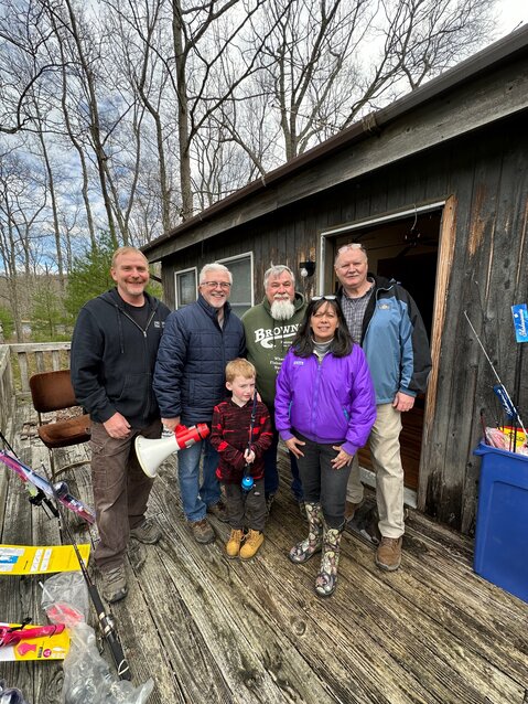 Pike County Maintenance Staff Member Pat DeFrancesco, left, back row; Pike County Commissioner Matthew Osterberg; volunteer Randy Fuller; ike County Maintenance Supervisor Ed Haberzettl; last year's derby 5-and-under winner Lucas Beers, front row; and Fishing Derby Coordinator Lorraine Lombardo.