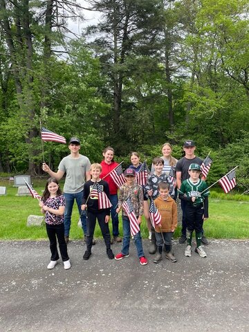 The MapleLine 4-H Club honored Veterans on Memorial Day. Each member has a Veteran in their family. Pictured are, in back row: AJ Dutton, left; Aurora Dutton; Mikayla Diehl; Leah Salzameda; and Landon Estus.