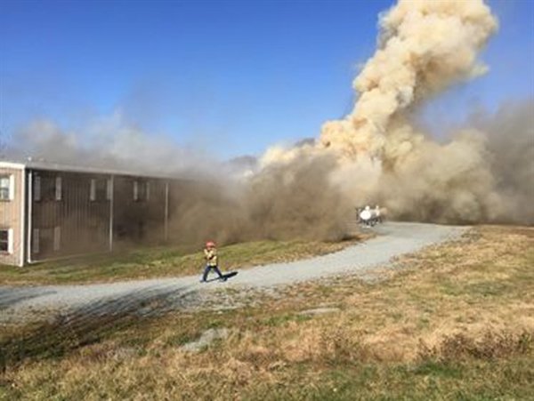 Firefighters who arrived on the scene met a large plume of smoke rising from the building.
