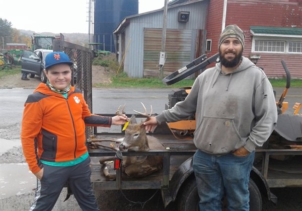 Haden Nicosia, right, of Jeffersonville, took this eight-pointer  that weighed 124.80 and scored 172.30 in the Youth Hunt.