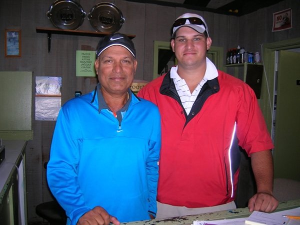 In a photo taken 10 years ago, then Director of Golf at Kutsher's Country Club Pravin Singh, left, is with his son, John, who also provided golf lessons at that time.