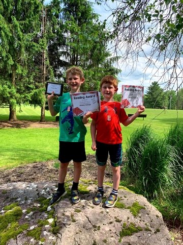 Champion readers Tucker Zietz, 9 yrs old, read 282 books and his brother Brayden, 7yrs old, logged 272 books during the Sullivan County Reading Challenge placing the George Ross Mackenzie School in first Place during this year's Reading Challenge.