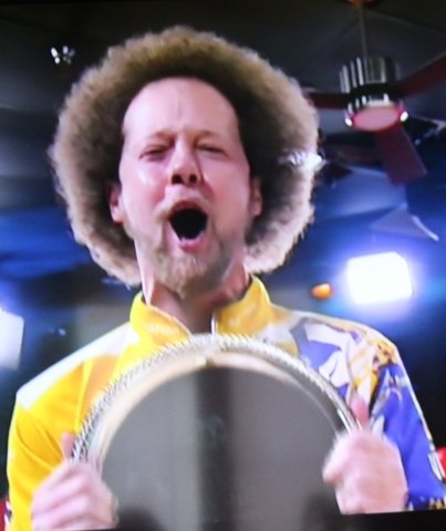 With his famed afro in view Kyle Troop holds the championship trophy at the PBA Players Championship at Bowlero Jupiter in Jupiter, Fla.